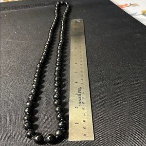 Vintage hand-knotted black bead necklace. Perhaps hematite.